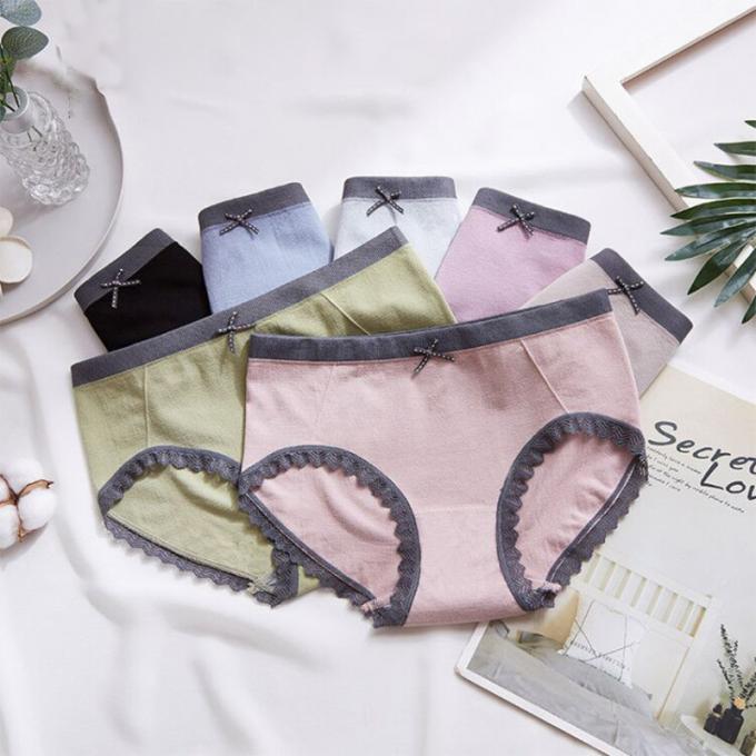 Оптовые трусы нижнего белья шнуруют Panty бикини для женщин нижнего белья хлопка талии женщин безшовных средних