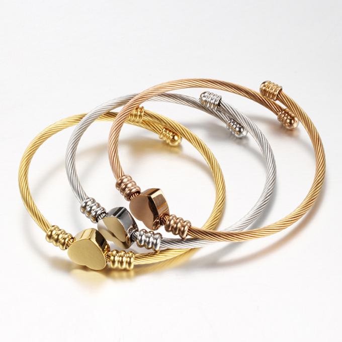 Золото браслета Bangles дизайнеров нержавеющей стали Bangles моды покрыло женщин Bangle